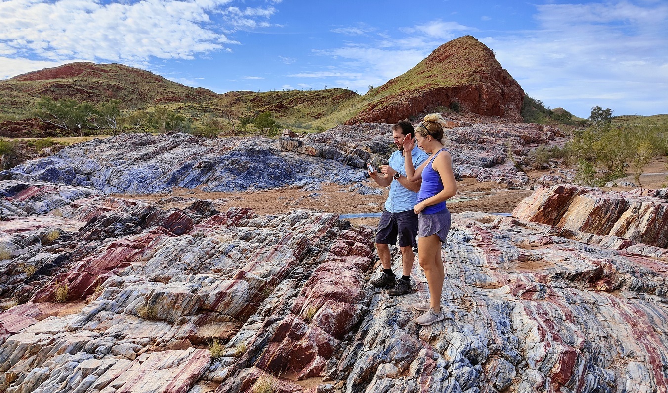 Admiring a stunning rock formation at Marble Bar
